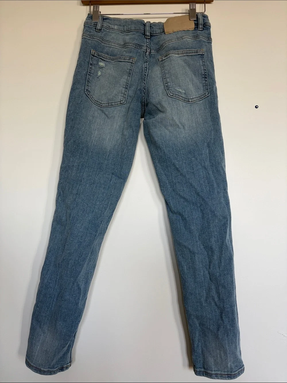 Nike Beige Pants with Light Blue Jeans and Brown Joggers
